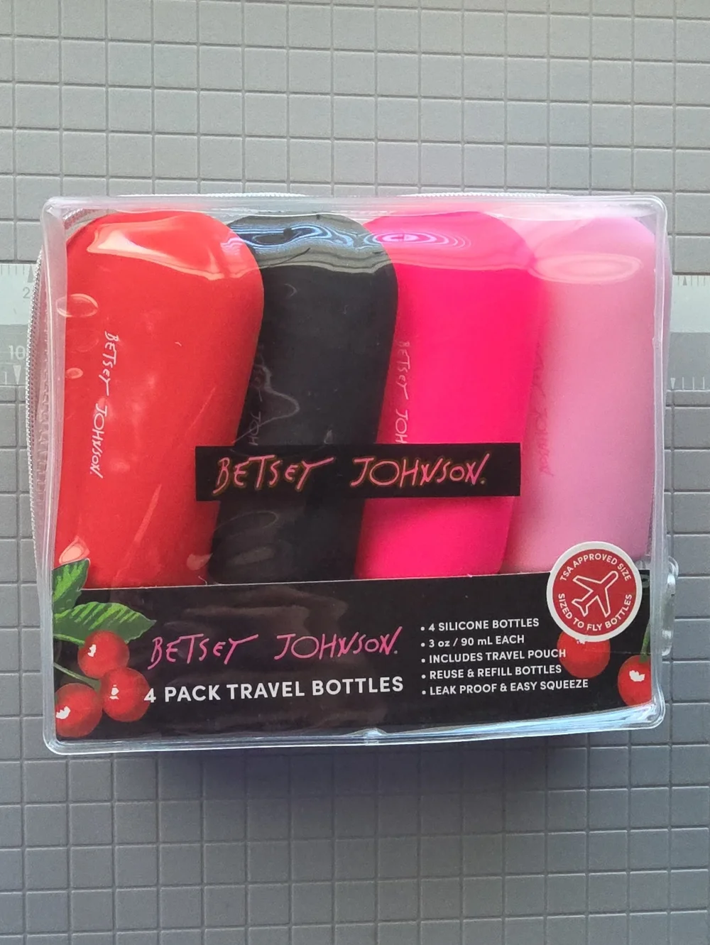 Betsey Johnson Pink, Hot Pink & Black Silicone Travel Bottle Set